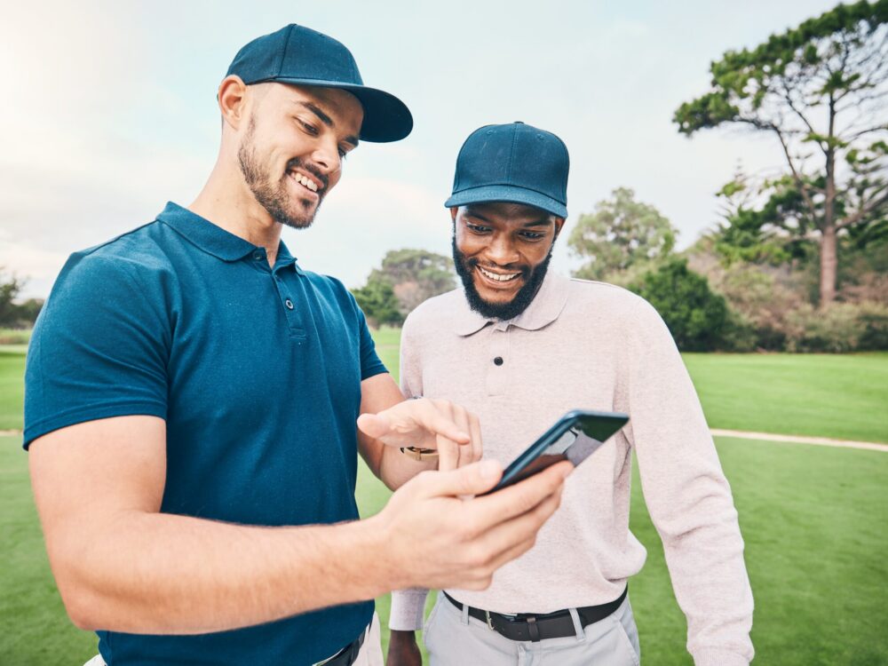 Golf,Course,,Men,And,Friends,With,Talk,For,Using,Phone, Golf,Course,,Men,And,Friends,With,Talk,For,Using,Phone,